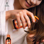 Aceite Capilar Argán Siliconado 100ml de Corpo Dourado - aceite capilar para nutrición foto 5 en Maquilladas.cl